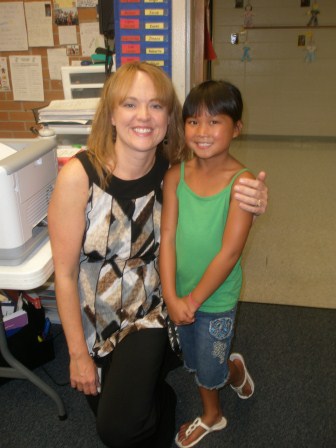 Kasen and her teacher at school open house